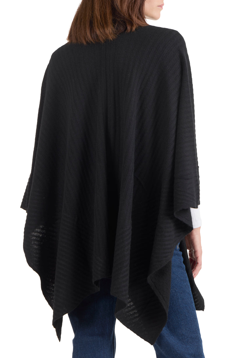 model wearing CASHMERE TRAVELING RIB CAPE in black back