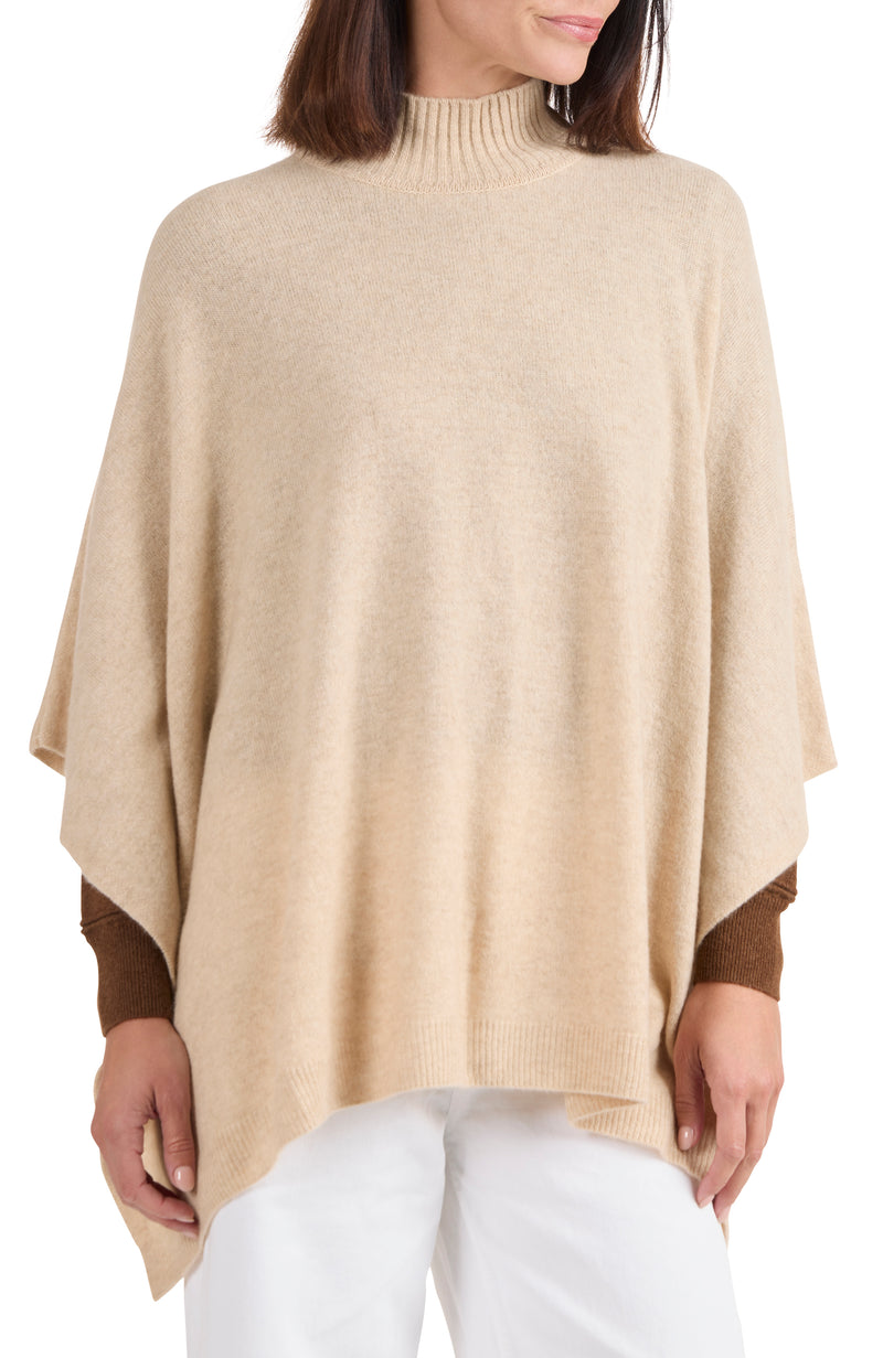 model wearing CASHMERE KNIT FUNNEL NECK PONCHO in oat front