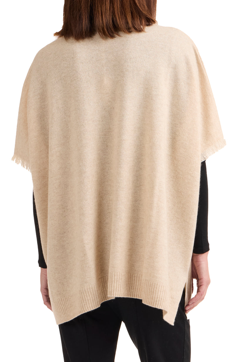 model wearing CASHMERE KNIT CAPE WITH FRINGE in oat back