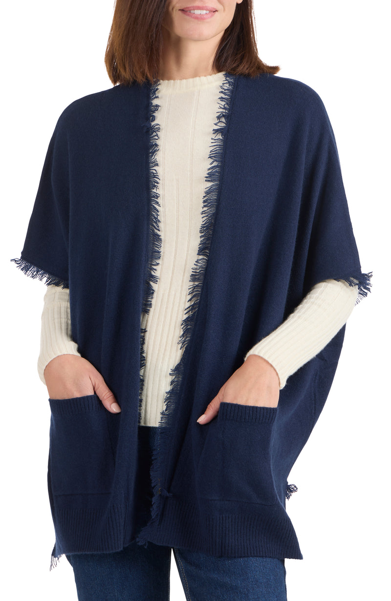 model wearing CASHMERE KNIT CAPE WITH FRINGE in navy front