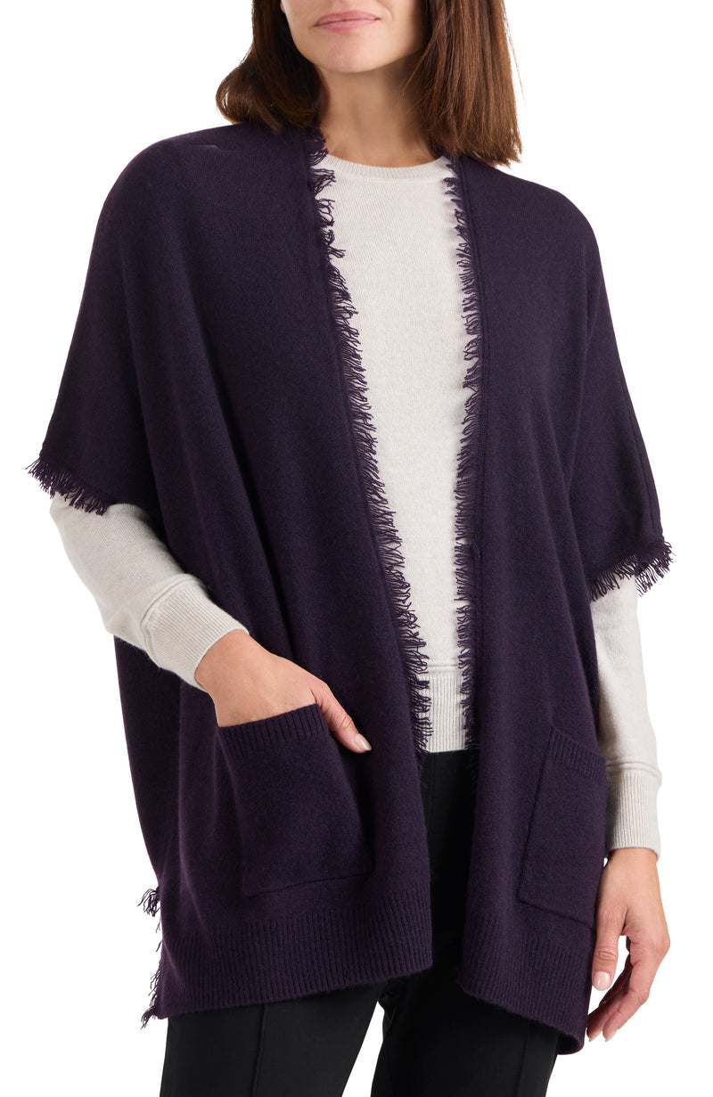 model wearing CASHMERE KNIT CAPE WITH FRINGE in dark currant front