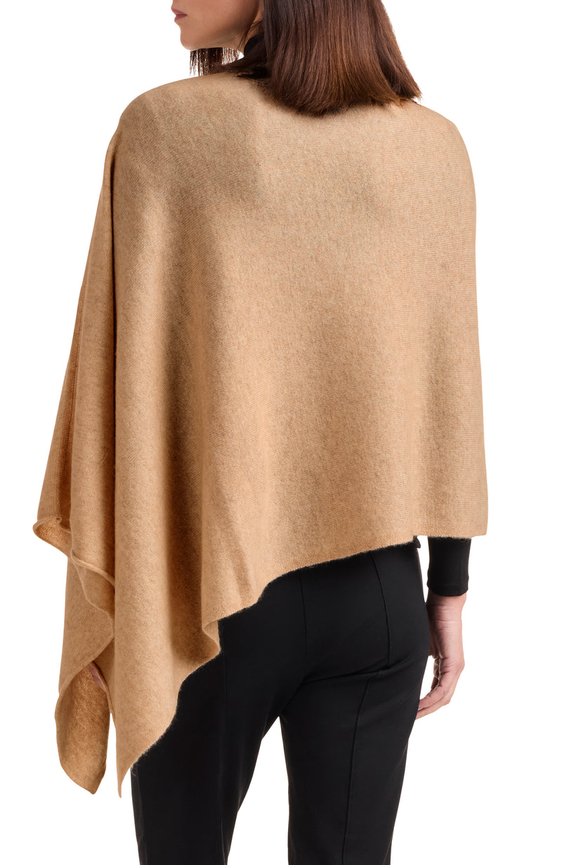 model wearing CASHMERE JERSEY ASYMMETRICAL PONCHO in camel back