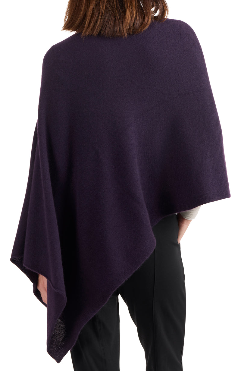 model wearing CASHMERE JERSEY ASYMMETRICAL PONCHO in dark currant back