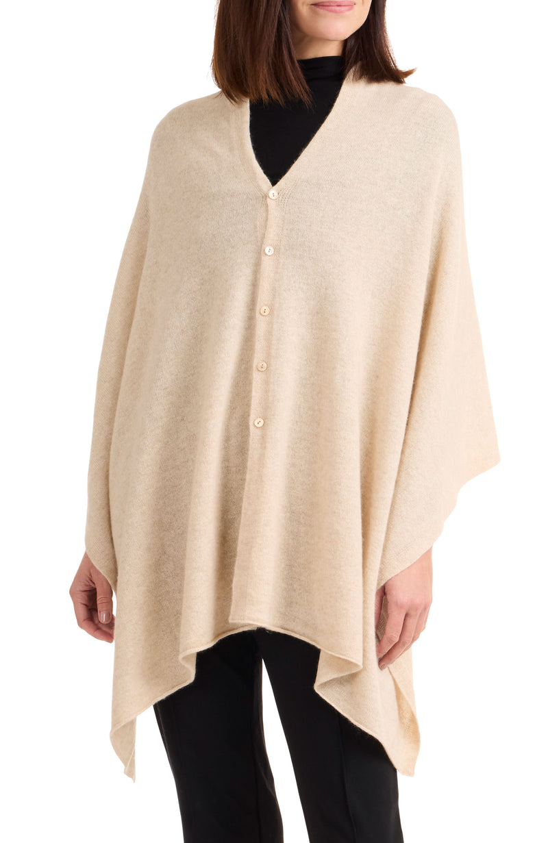 Model wearing CASHMERE BUTTON SHOULDER PONCHO + WRAP in oat