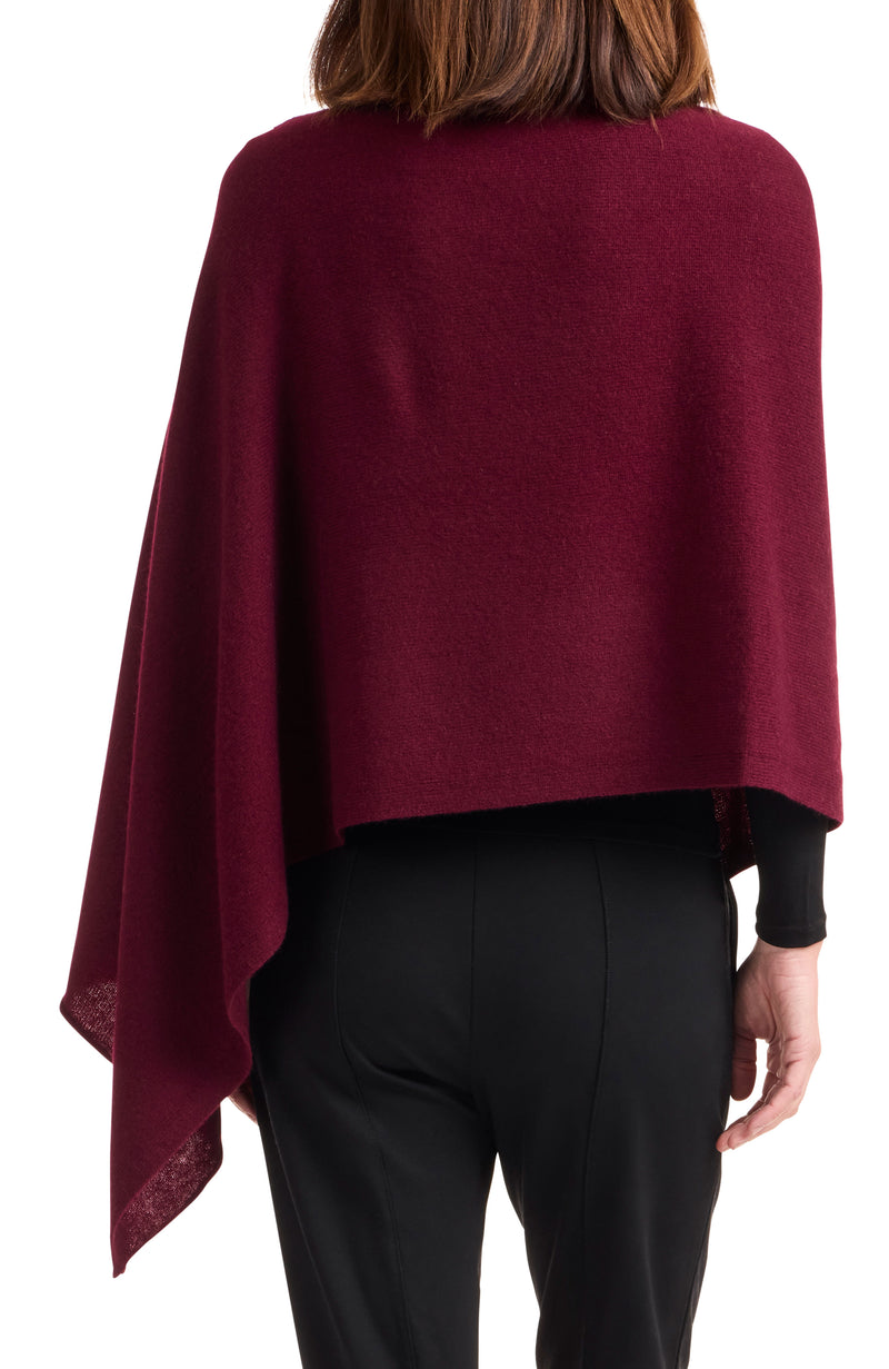 Model wearing CASHMERE BUTTON SHOULDER PONCHO + WRAP in bordeaux