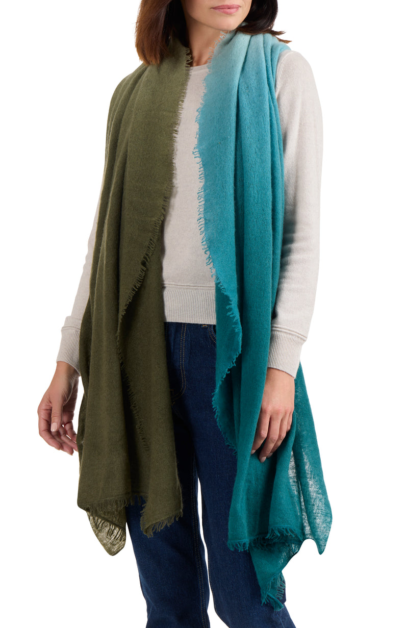 model wearing CASHMERE FELTED DIP DYE SCARF WITH FRINGE in olive-teal