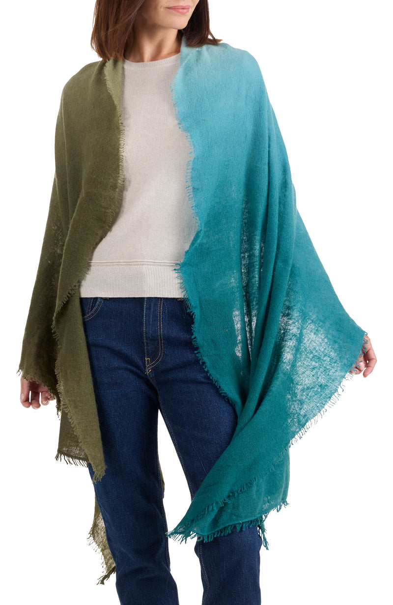 model wearing CASHMERE FELTED DIP DYE SCARF WITH FRINGE in olive-teal