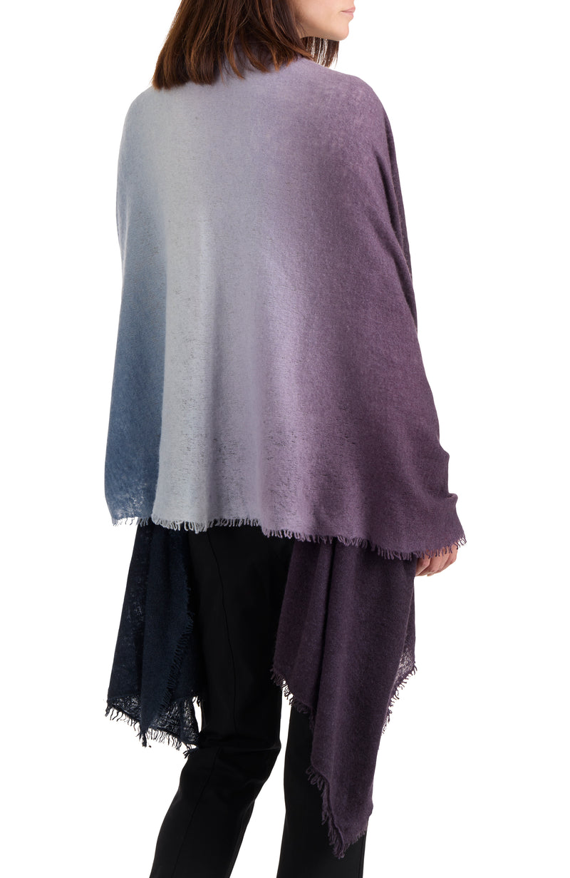 model wearing CASHMERE FELTED DIP DYE SCARF WITH FRINGE in dark currant-navy