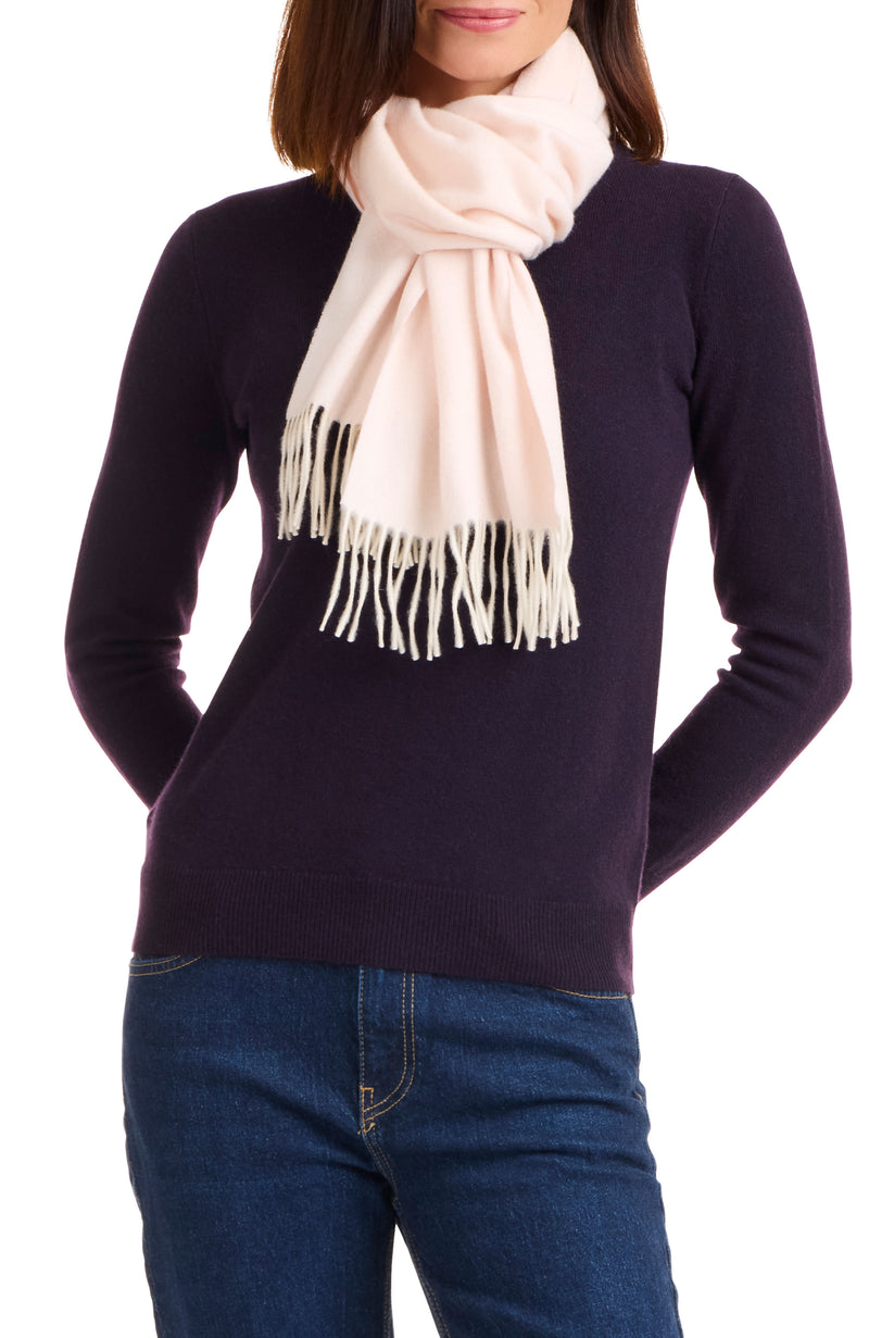 model wearing CASHMERE MELANGE SOLID SCARF in light pink